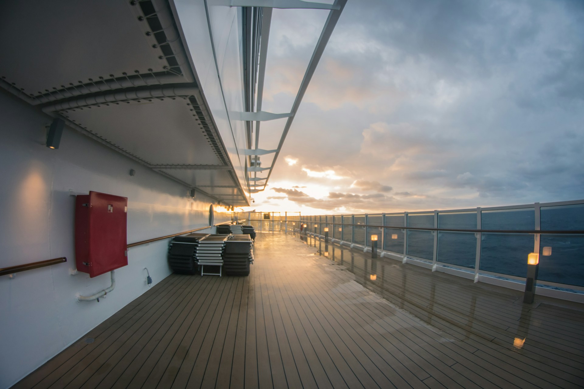 Sunrise over the open ocean, seen from a cruise ship deck